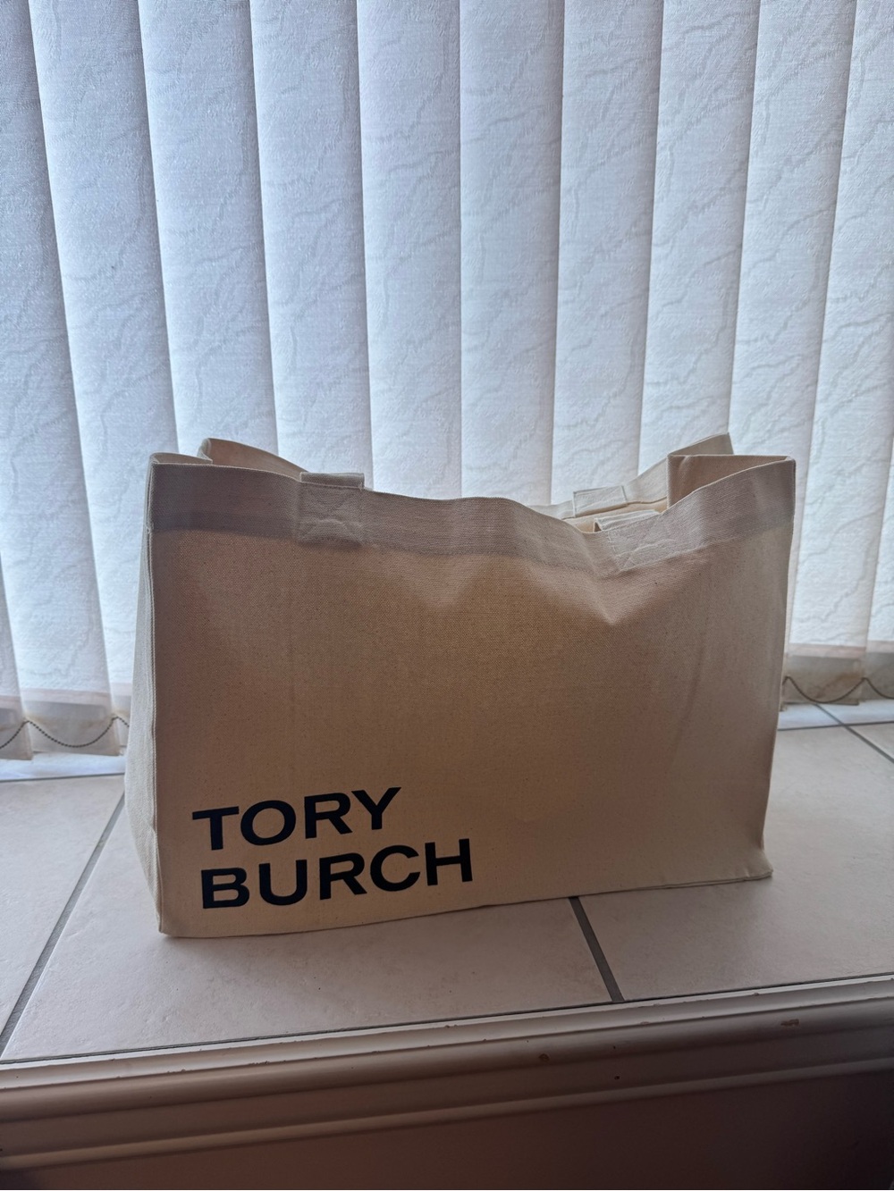 Tory Burch Cream Canvas Duffel Tote with Black Logo